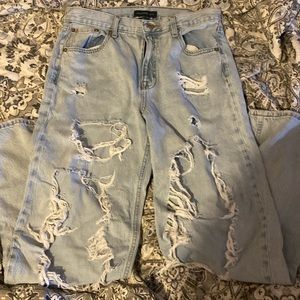 A pair of baggy 90’s ripped jeans